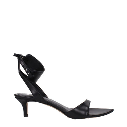 Isabel Marant Black Leather Flat Sandals with buckle closure, open toe, and mid heels. Stylish and elegant women's footwear.