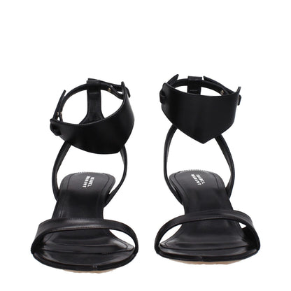 Isabel Marant Black Leather Flat Sandals with buckle closure, open toe, and mid heels. Stylish black leather sandals perfect for summer fashion.
