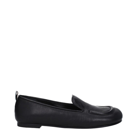 Premiata Black Leather Slip-On Loafers with round toe and low flat heel, featuring a back logo and leather sole. MPN PELLEM6705NERO.