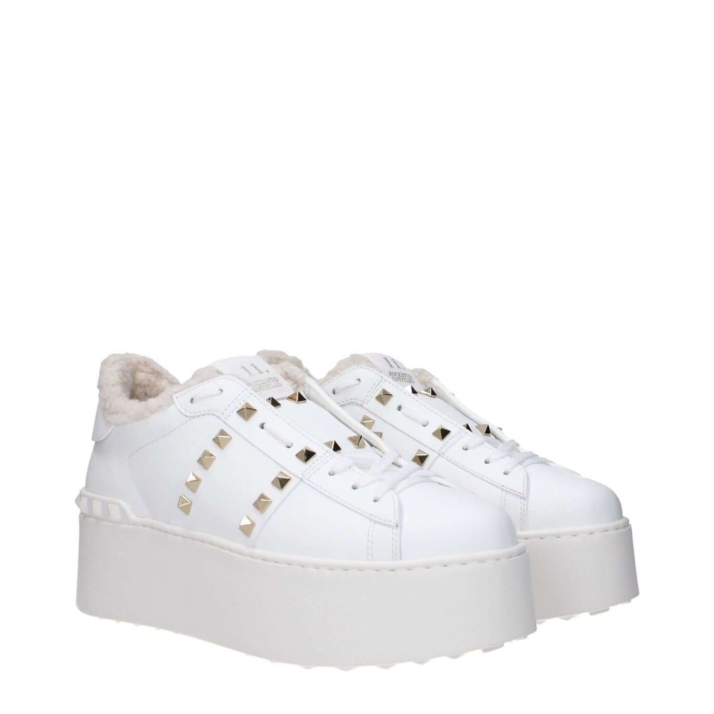Valentino Garavani White Leather Platform Sneakers with studs, lace-up closure, and rubber sole