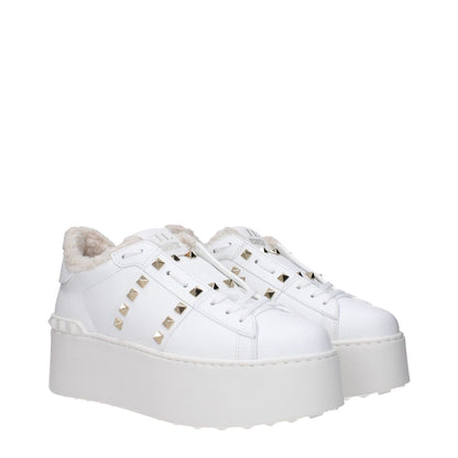 Valentino Garavani White Leather Platform Sneakers with studs, lace-up closure, and rubber sole