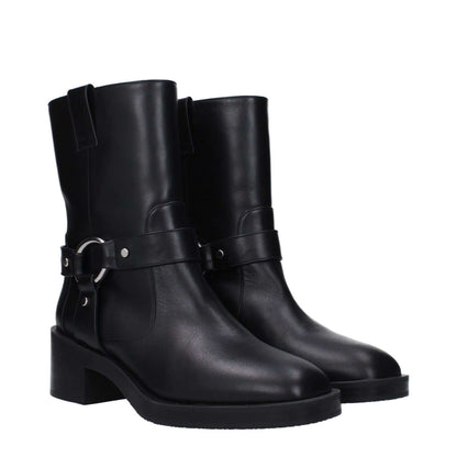 Stuart Weitzman Black Leather Ankle Boots with mid heel and round toe, featuring silver details and rubber sole for casual wear.