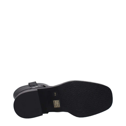 Sole view of Stuart Weitzman Black Leather Ankle Boots showing rubber sole and mid heel.