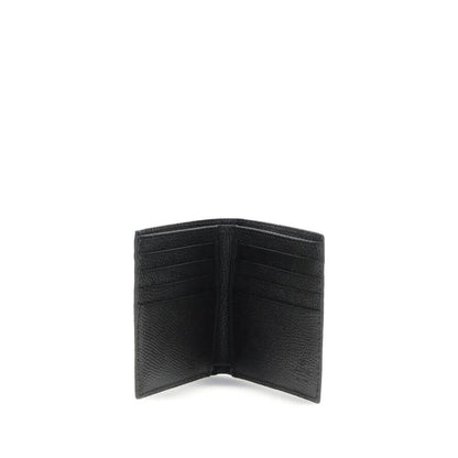 Valentino Garavani Black Calf Leather Bos Taurus Wallet with eight card slots and logo plaque, bifold design, elegant accessory