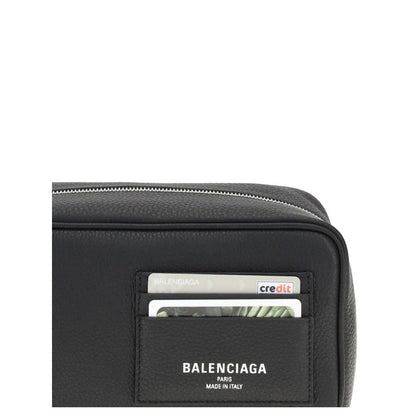 Balenciaga Black Calf Leather Bos Taurus Handbag with card slots and logo, showcasing functionality and style.