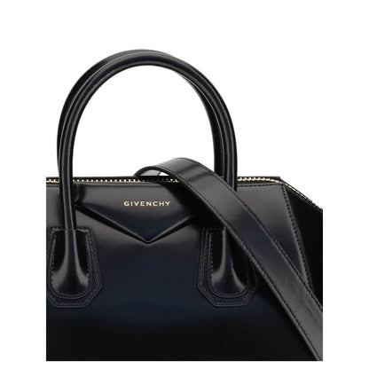 Givenchy Black Calf Leather Bos Taurus Handbag with gold embossed logo and leather strap detail.
