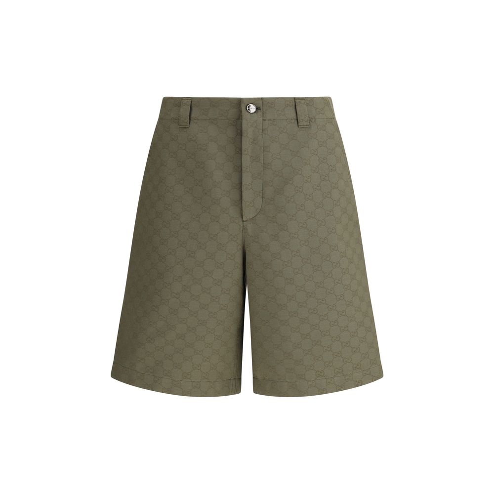 Gucci Green Cotton Bermuda Shorts with GG pattern and front zipper, perfect for a casual yet distinctive look, made of 70% cotton.