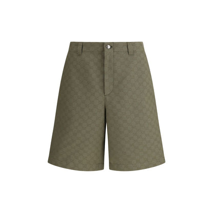 Gucci Green Cotton Bermuda Shorts with GG pattern and front zipper, perfect for a casual yet distinctive look, made of 70% cotton.