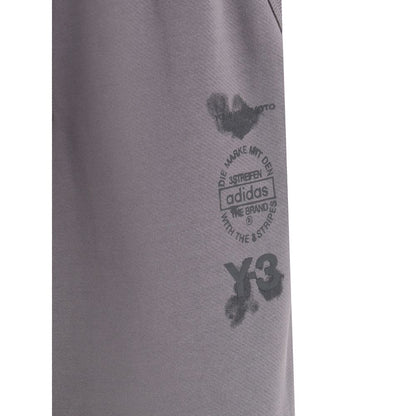Close-up of Y-3 Gray Cotton Joggers' logo detail, showcasing the unique branding on the workout pants.