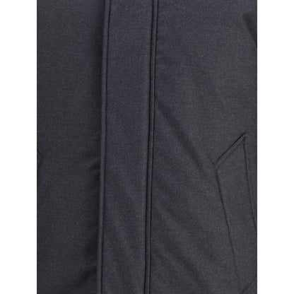 Close-up of Woolrich Black Fleece Wool Parka showing quilted design and side welt pockets.