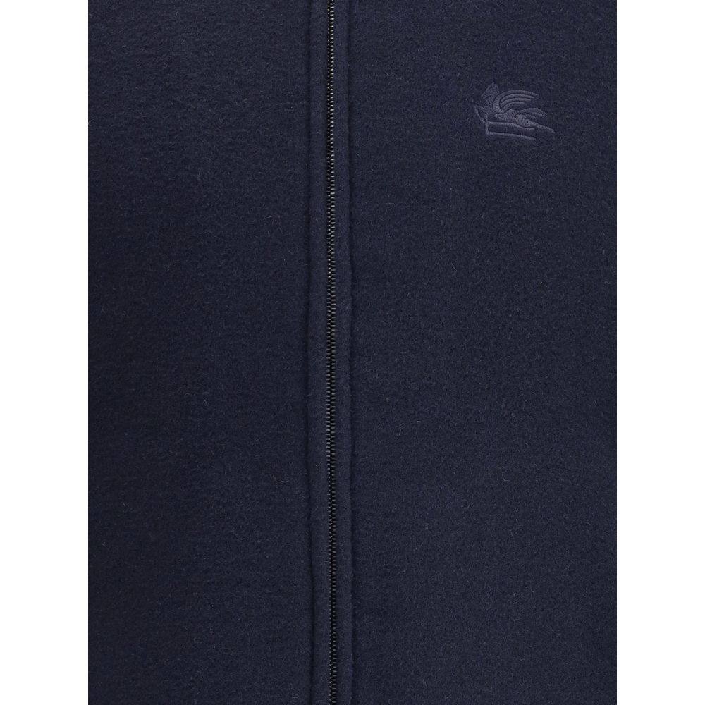 Close-up of Etro Blue Wool Bomber with tone-on-tone embroidered Pegasus logo and front zipper.