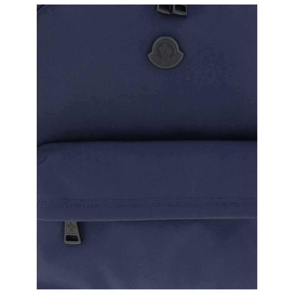 Moncler Blue Nylon Backpack with water-repellent material and leather trim for durability and elegance.