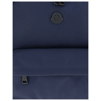 Moncler Blue Nylon Backpack with water-repellent material and leather trim for durability and elegance.