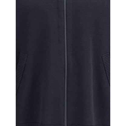 Close-up of Thom Browne Blue Fleece Wool Cardigan with front zipper and welt pockets, highlighting the ribbed detailing and elegant design.