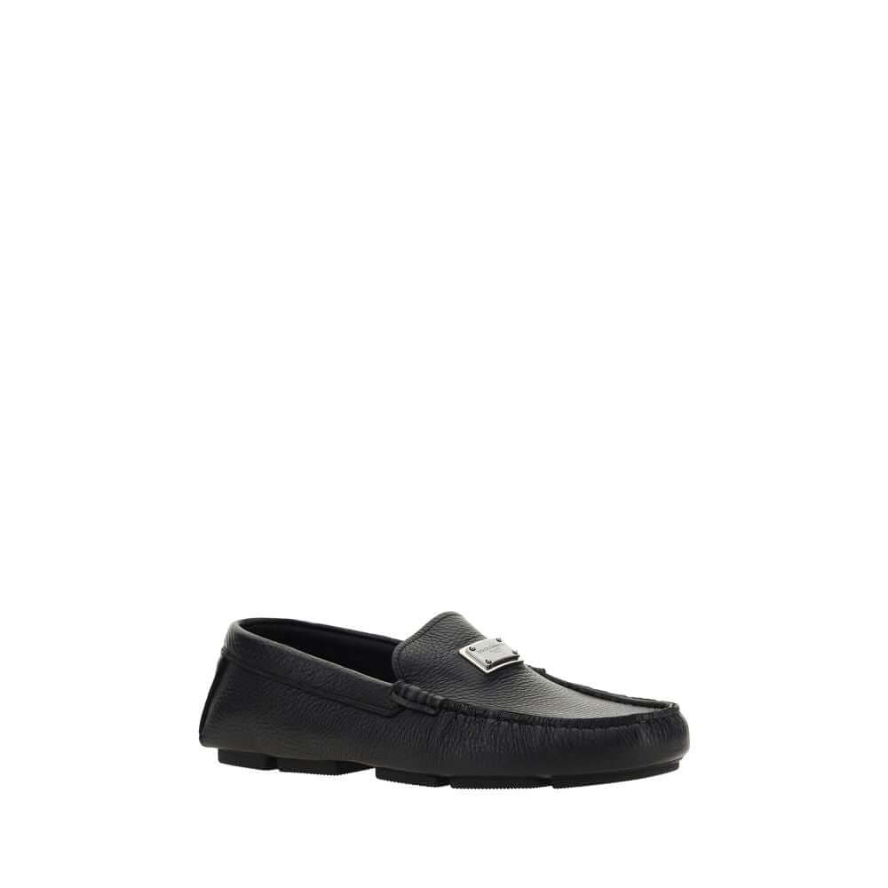 Dolce & Gabbana Black Rubber Slip-On Loafers with calfskin upper and iconic metal plaque, non-slip sole, AW25 collection.