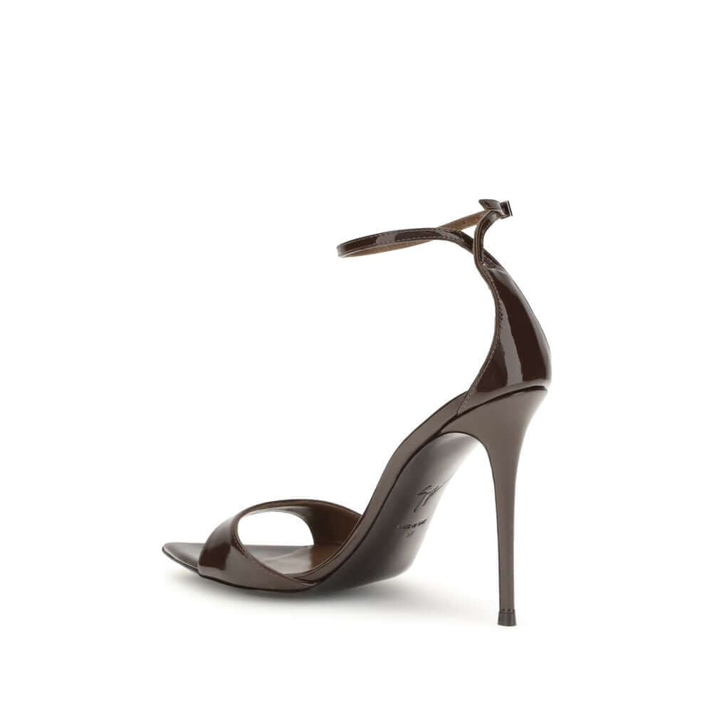 Giuseppe Zanotti Black Leather Stiletto Heel Sandals with silver-tone metal strap and pointed open-toe design