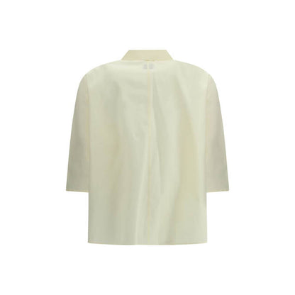 Cruna Yellow Cotton Blouse with classic collar and 3/4 sleeves, back view, ideal for a refined look, SS25 collection.