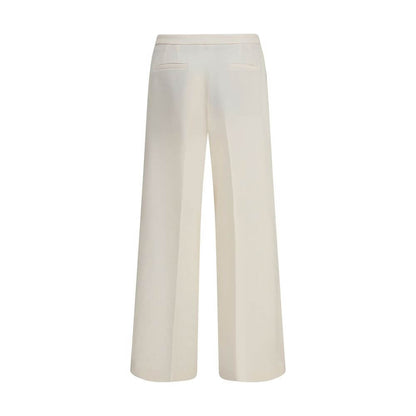 Cruna Cream Polyester Casual Pants wide leg design, back view showcasing welt pockets, modern silhouette, regular fit, autumn winter fashion.