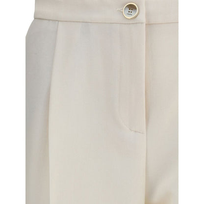 Close-up of Cruna Cream Polyester Casual Pants featuring front zip and button fastening with a clean, modern silhouette.