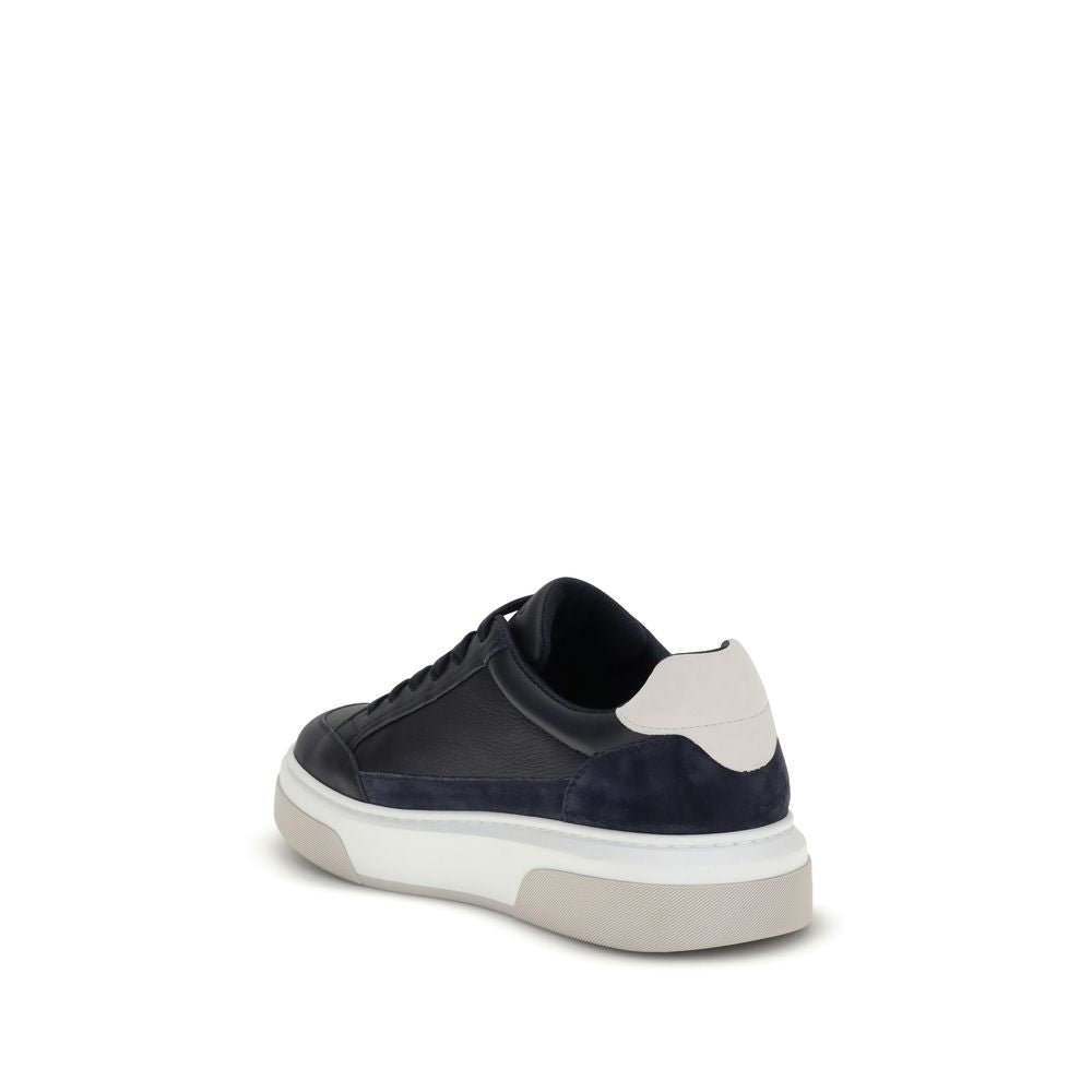 Ferragamo Blue Calf Leather Bos Taurus Low Top Sneakers with suede inserts, Gancini silhouette, and rubber sole, back view.