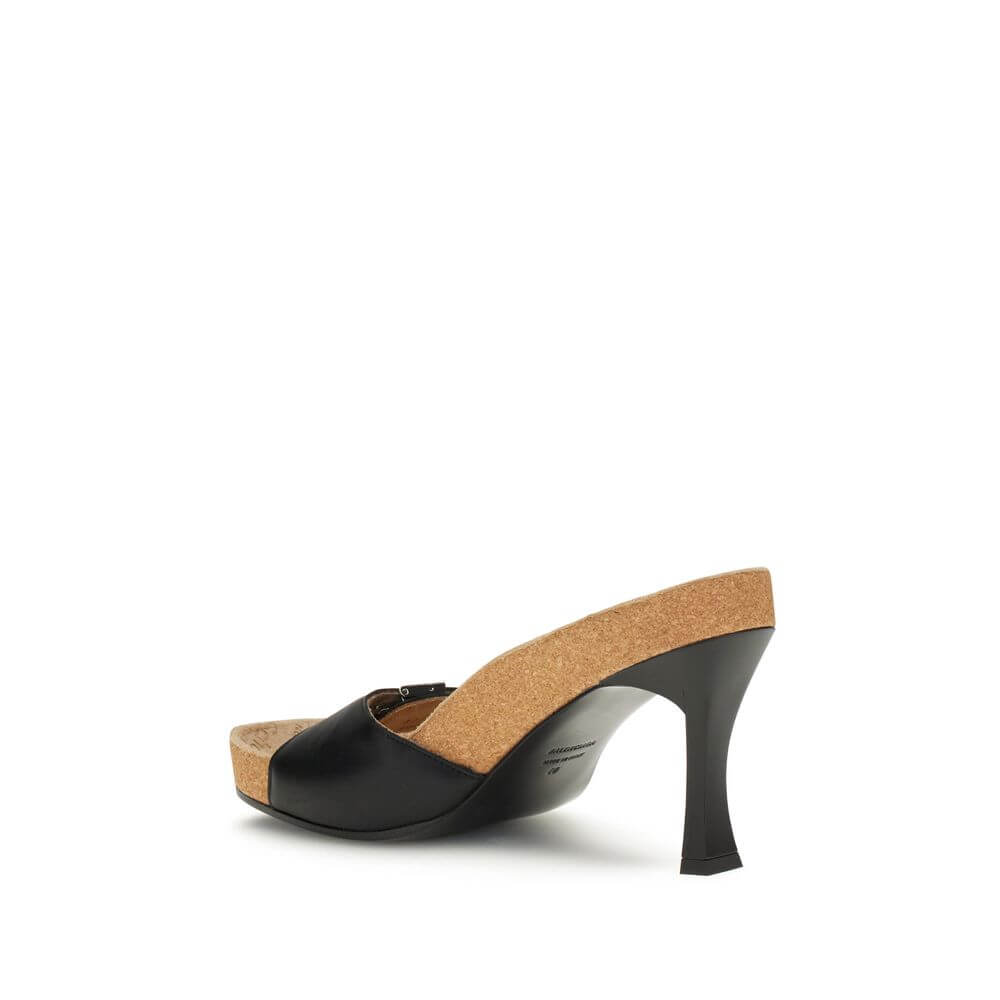 Balenciaga Black Calf Leather Bos Taurus Stiletto Heel Sandals with cork-covered sole and ergonomic insole, side view.