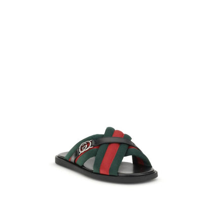 Gucci Black Polyamide Flat Sandals with green and red Web fabric, featuring silver-tone Interlocking GG logo. Made in Italy.