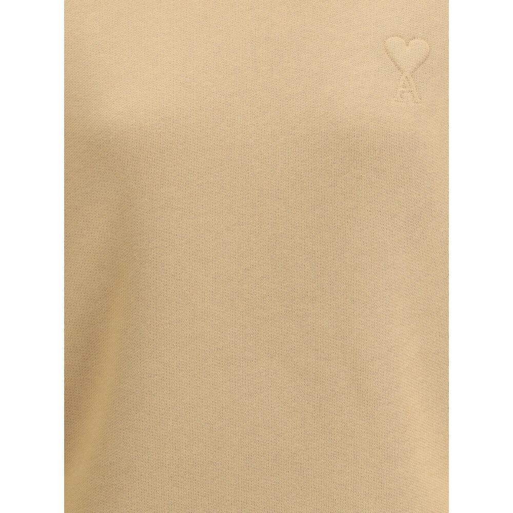 Ami Paris Beige Cotton Sweatshirt with iconic Ami de Coeur logo and luxurious tone-on-tone embroidery, offering a stylish and comfortable fit.