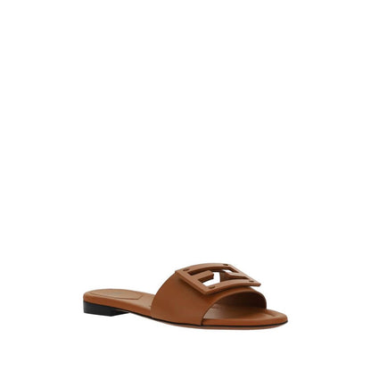 Fendi Brown Calf Leather Bos Taurus Flat Sandals with open toe and FF logo plaque, slip-on style, made in Italy.