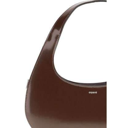 Coperni Brown Leather Shoulder Bag with curved design and smooth matte finish, perfect for everyday elegance and style.