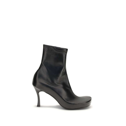 Balenciaga Black Calf Leather Bos Taurus Ankle Boots featuring ergonomic insole and embossed logos, side view.