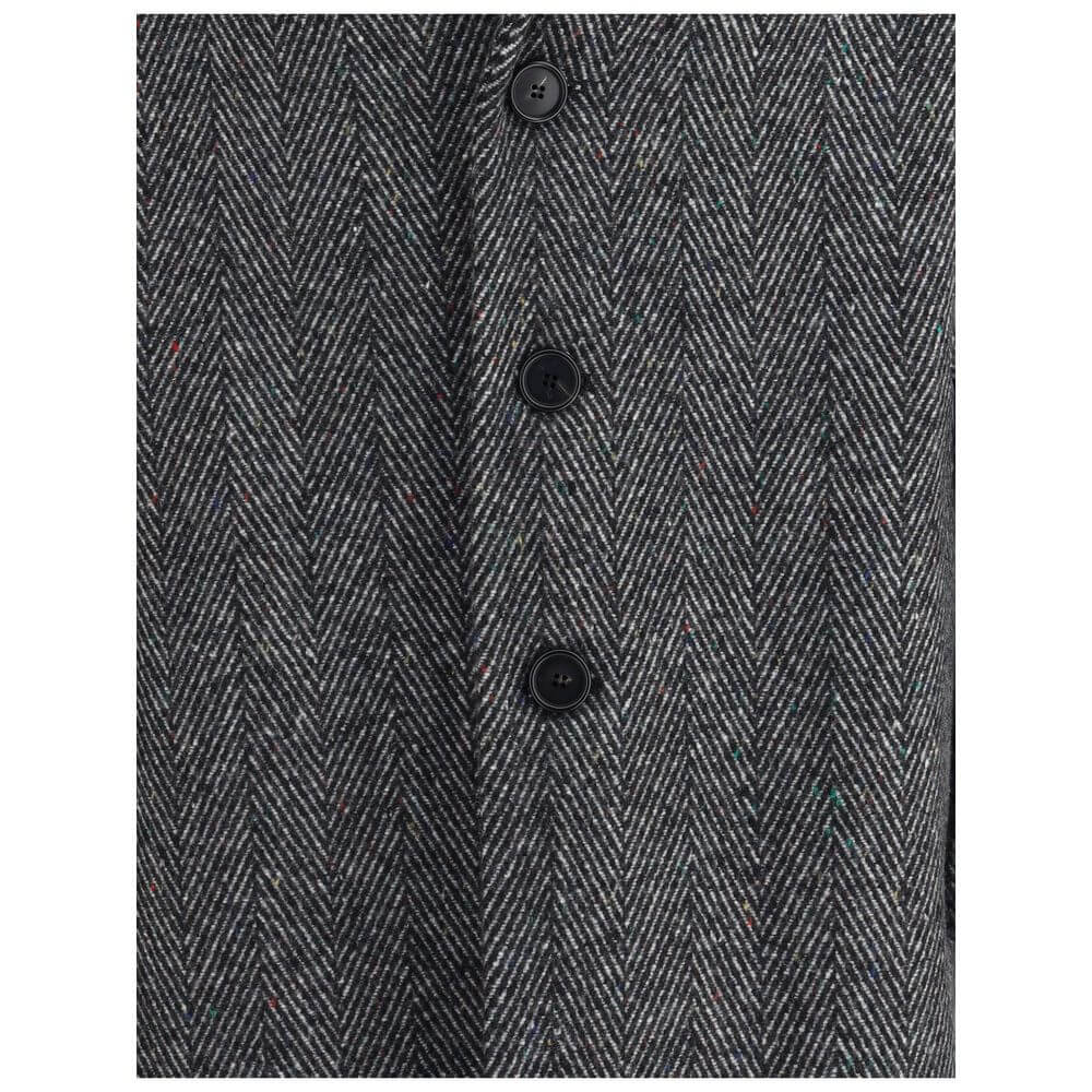 Close-up of Givenchy Gray Wool Coat showcasing herringbone pattern with buttons, made of 80% wool and 20% polyamide.