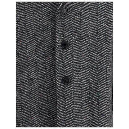 Close-up of Givenchy Gray Wool Coat showcasing herringbone pattern with buttons, made of 80% wool and 20% polyamide.