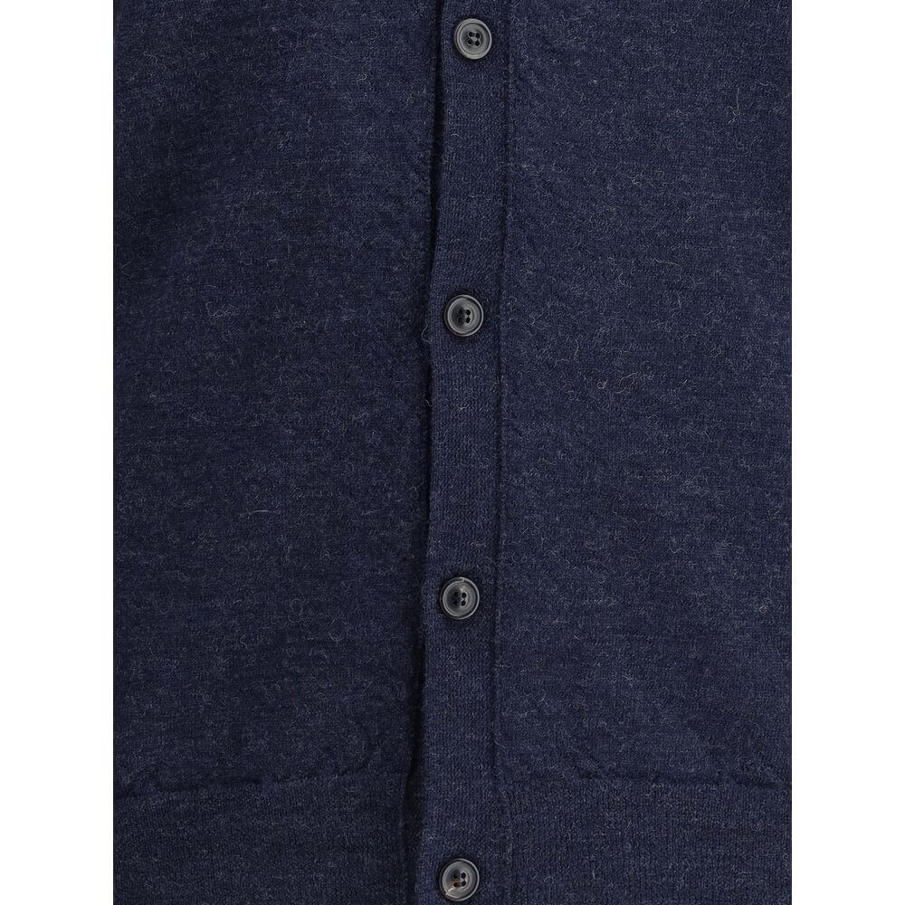 Close-up of Margiela Blue Wool Cardigan showing front button closure and texture, emphasizing classic elegance and timeless style.