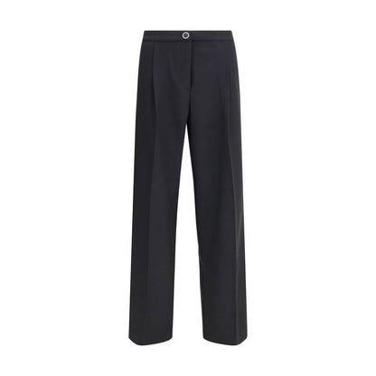 Cruna Black Polyester Casual Pants with wide leg, zip and button fastening, slash and welt pockets, modern silhouette.