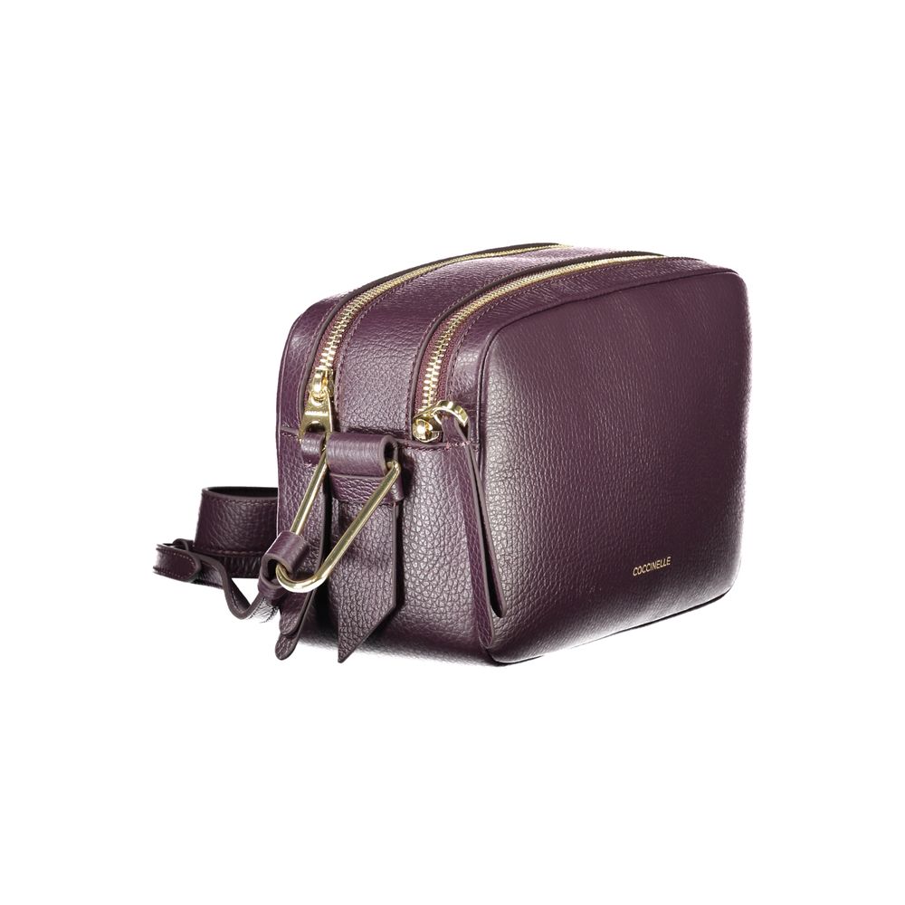 Coccinelle Purple Leather Women Handbag with adjustable shoulder strap and dual compartments, showcasing Italian sophistication.
