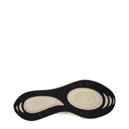 Sole view of Valentino Garavani White Fabric Athletic Sneakers, showcasing the rubber sole and logo design.