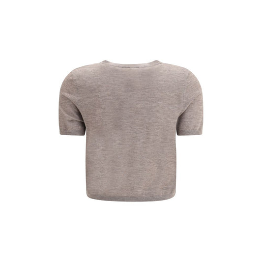 Back view of Lisa Yang Charlotte Cardigan in beige, featuring short sleeves and ribbed design, perfect for a modern, versatile look.