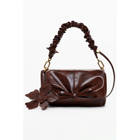 Stylish Desigual Brown Polyethylene Women Handbag with a floral accent and adjustable strap for versatile fashion.