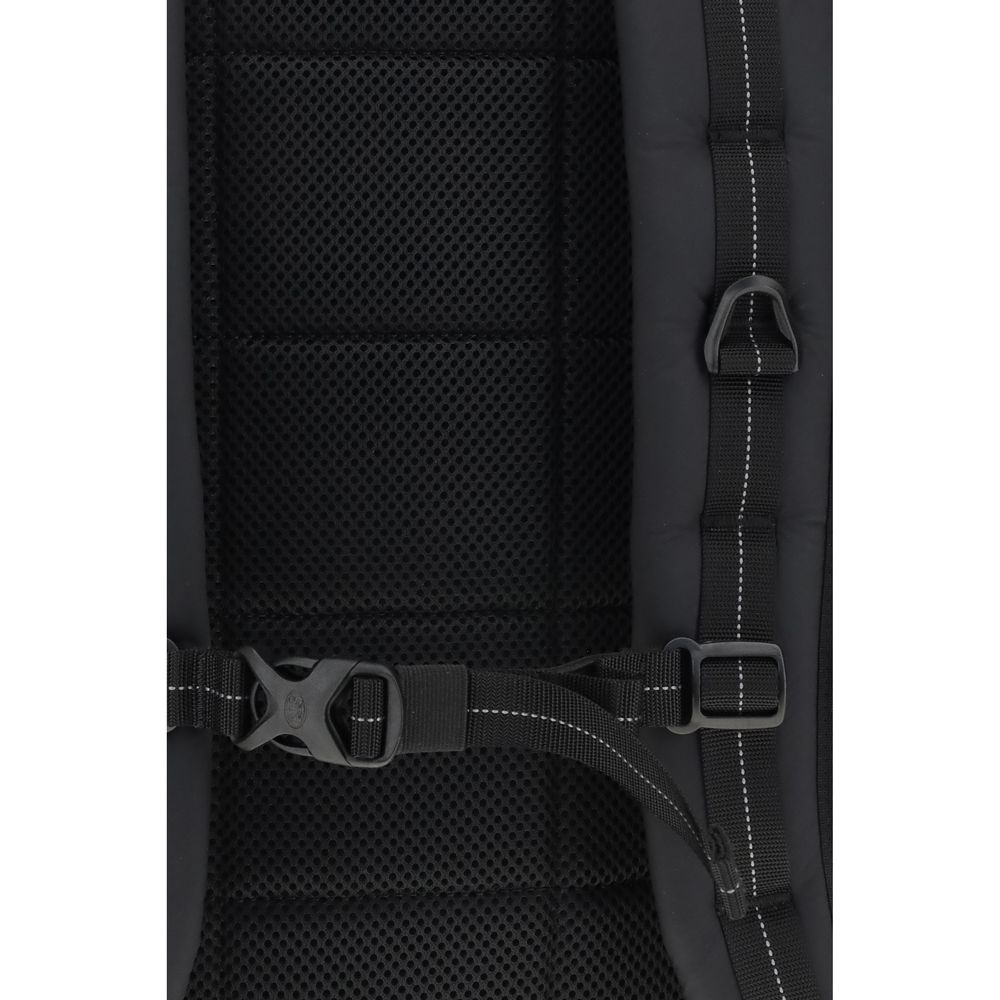 Close-up of Parajumpers Black Polyamide Backpack showing padded straps and black mesh material.
