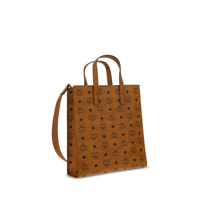 MCM Brown Polyethylene Shoulder Bag with iconic monogram pattern, adjustable strap, and magnetic button closure, 27x27x8 dimensions.