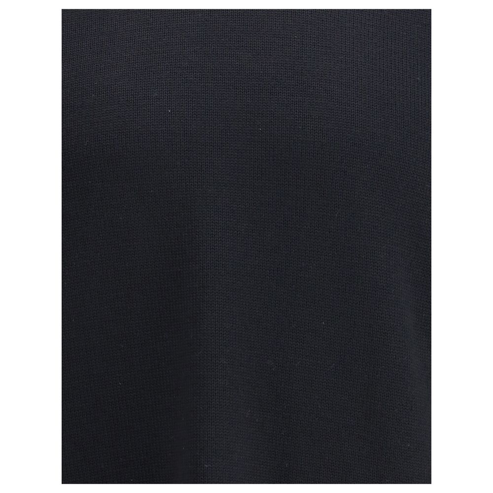 Close-up of material from Premiata Black Merino Wool Sweatshirt, highlighting fine wool texture and contemporary style with a logo patch detail.