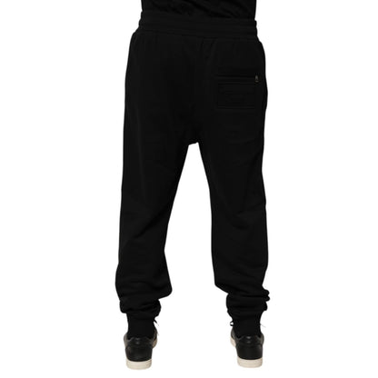 Dolce & Gabbana Black Cotton Drawstring Logo Sweatpants Pants rear view with logo patch on the back pocket, luxury casualwear.
