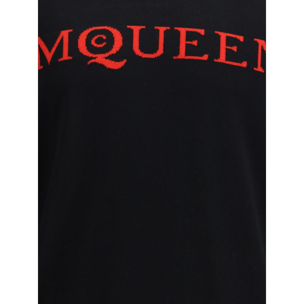 Close-up of Alexander McQueen Black Wool Sweatshirt displaying iconic red brand signature embroidery.