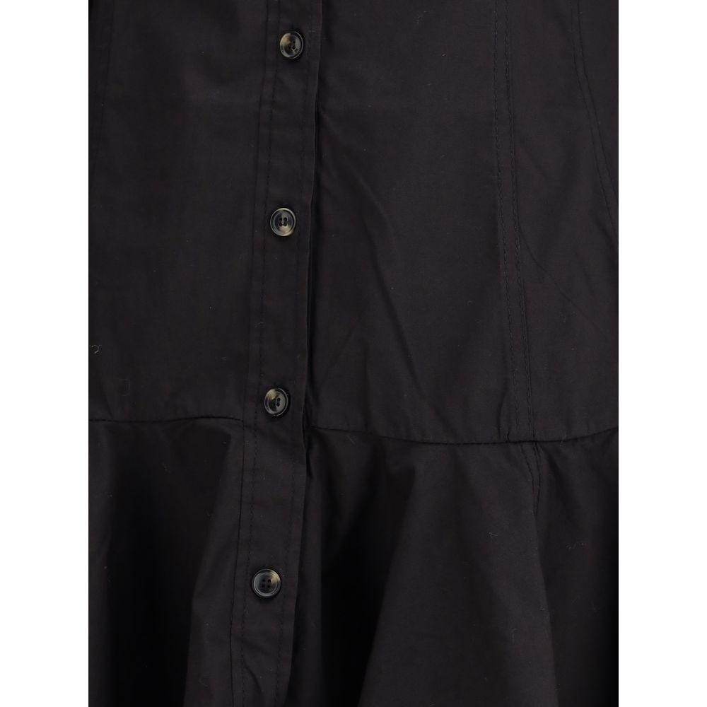 Close-up of Ganni Black Cotton Casual Dress showcasing buttons and fabric texture with a feminine gathered hemline, perfect for AW25 season.