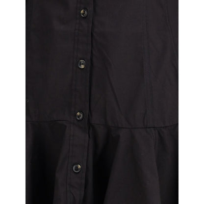 Close-up of Ganni Black Cotton Casual Dress showcasing buttons and fabric texture with a feminine gathered hemline, perfect for AW25 season.