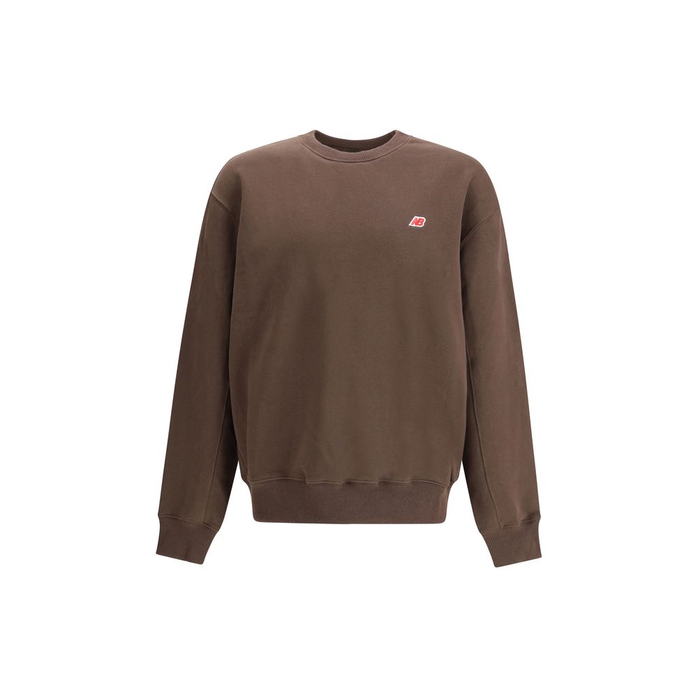 New Balance Brown Cotton Sweatshirt with crew neckline and ribbed cuffs, ideal for casual wear, featuring a minimalist design.