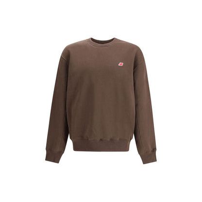 New Balance Brown Cotton Sweatshirt with crew neckline and ribbed cuffs, ideal for casual wear, featuring a minimalist design.