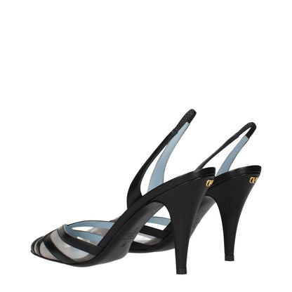 Valentino Garavani Black Leather High Heel Pumps with pointy toe and logo on back, featuring a sleek design and high heel style.