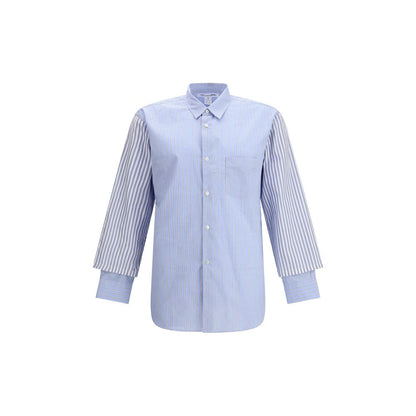 Comme Des Garçons Light Blue Cotton Pattern Shirt with subtle stripes and double cuffs for avant-garde style.