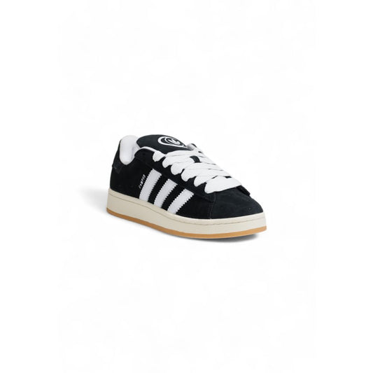 Adidas Black Suede Leather Sneaker with iconic three stripes and rubber sole for everyday wear and casual occasions.
